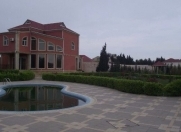Satılır 8 otaqlı 450 m2 həyət evi Novxanı