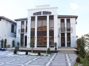 Satılır 13 otaqlı 1050 m2 həyət evi Caspian Shopping Center