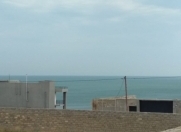 Satılır 12 sot torpaq Dalğa Plaza