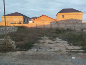 Satılır 4.3 sot torpaq Binə