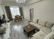 Satılır 3 otaqlı 130 m2 yeni tikili Bakı